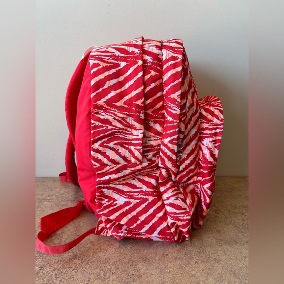 Jansport Backpack in Red, Orange and White Animal like print - Picture 3 of 10